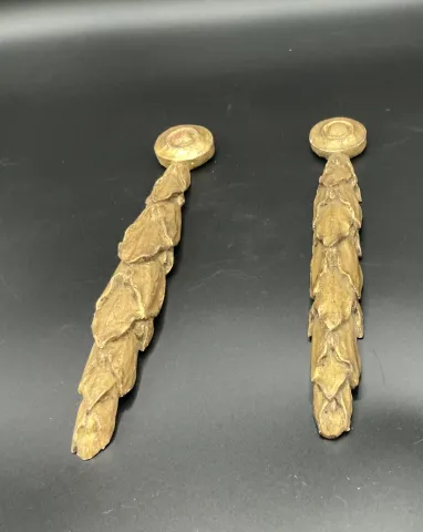 Paire de chutes en bois doré