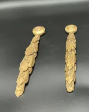 Paire de chutes en bois doré